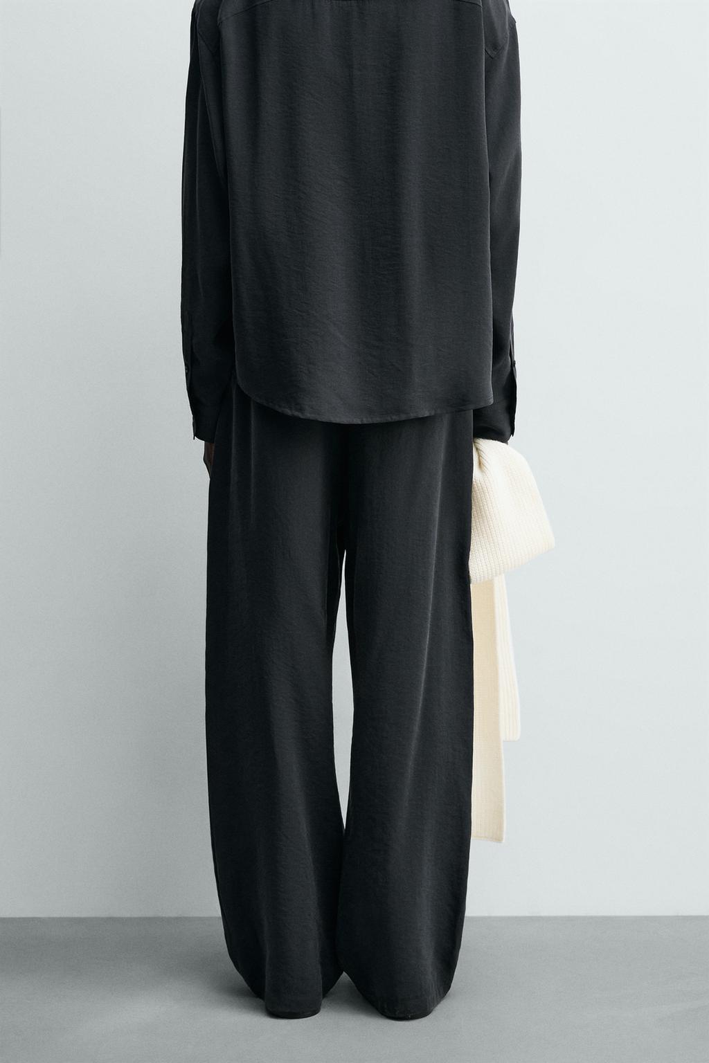 Потрепанные брюки свободного кроя