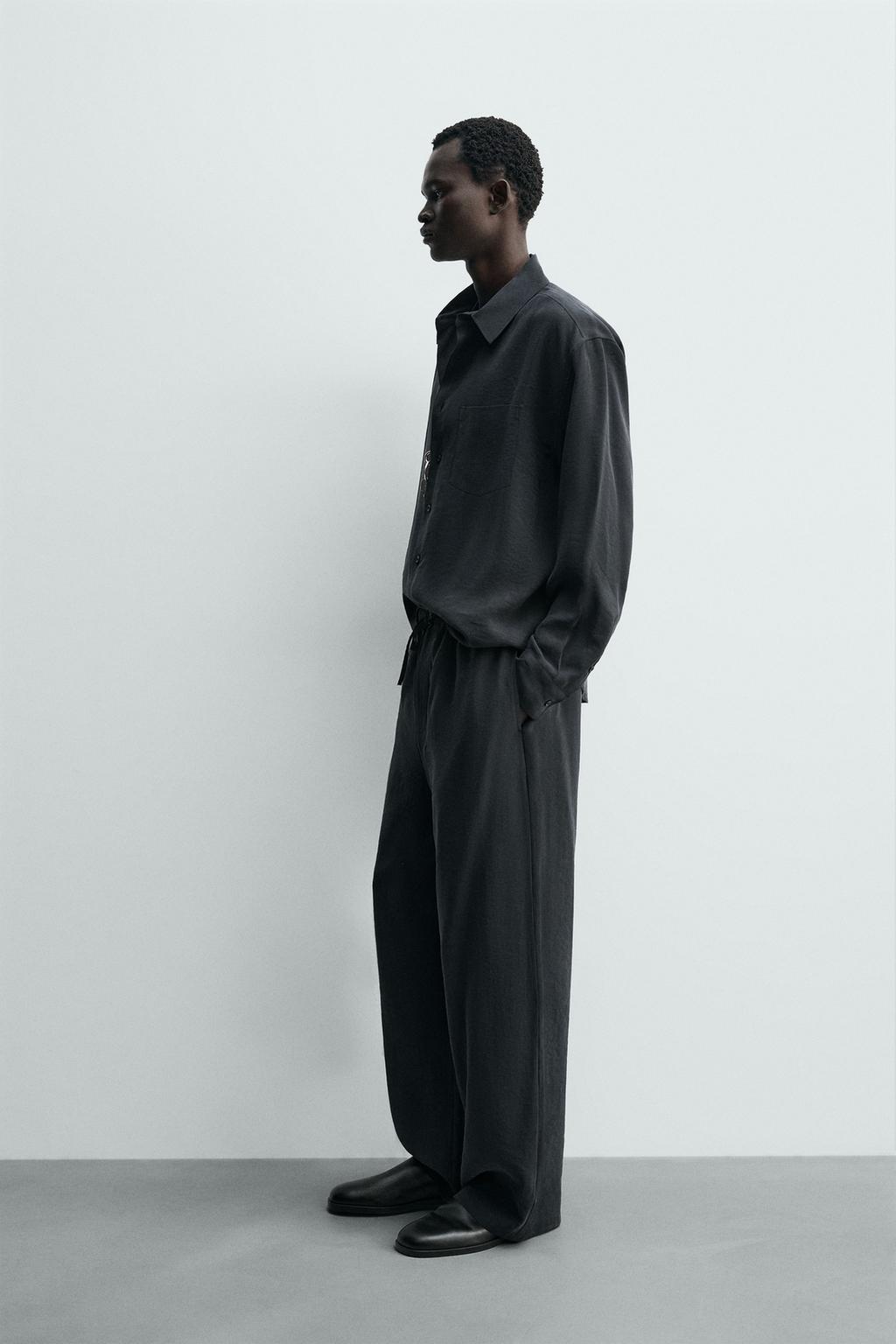 Потрепанные брюки свободного кроя