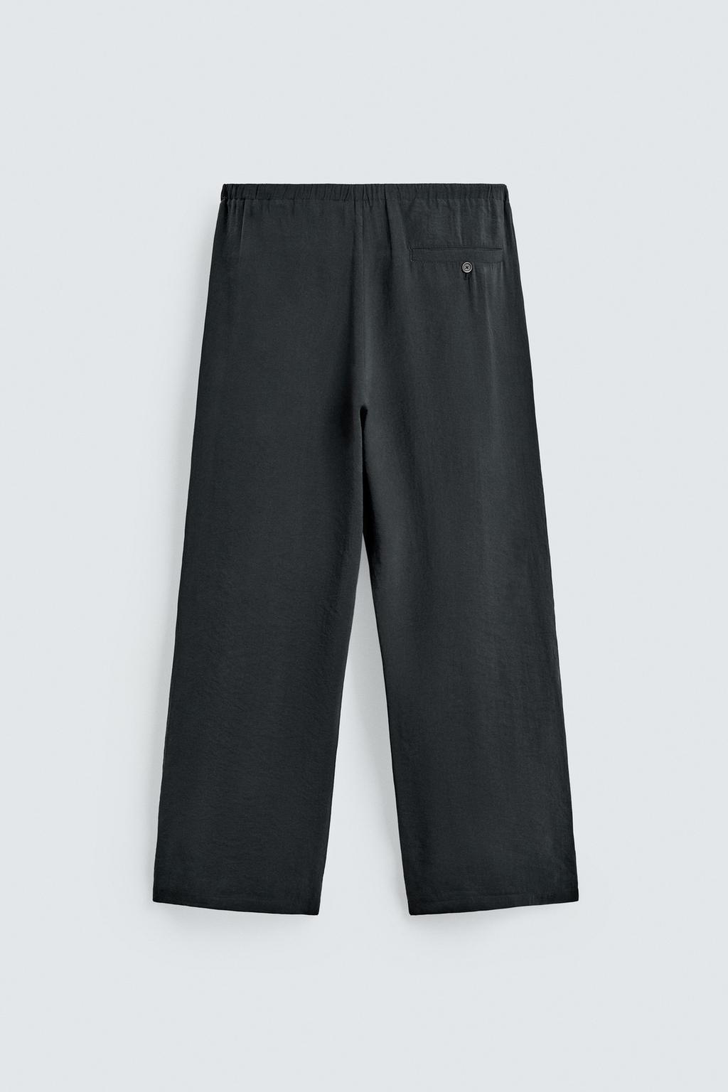 Потрепанные брюки свободного кроя