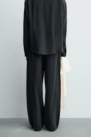 Потрепанные брюки свободного кроя