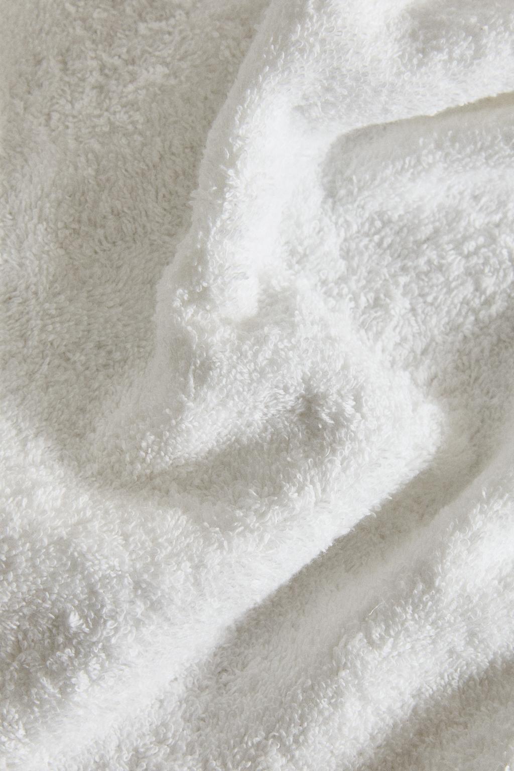 Полотенце для ванны с аппликацией листьев вышитых мотивов