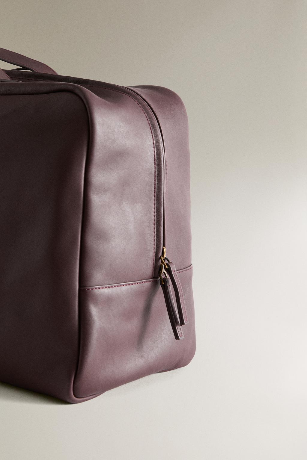 Кожаная сумка для путешествий