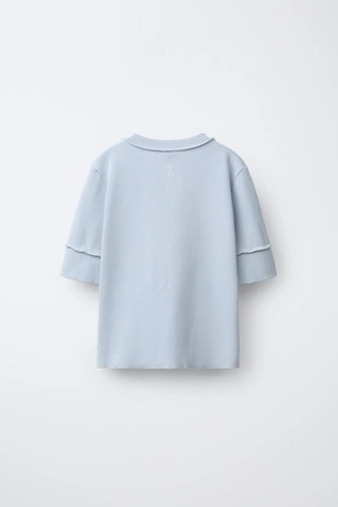 Футболка оверлок с пуговицами- Заказать в России