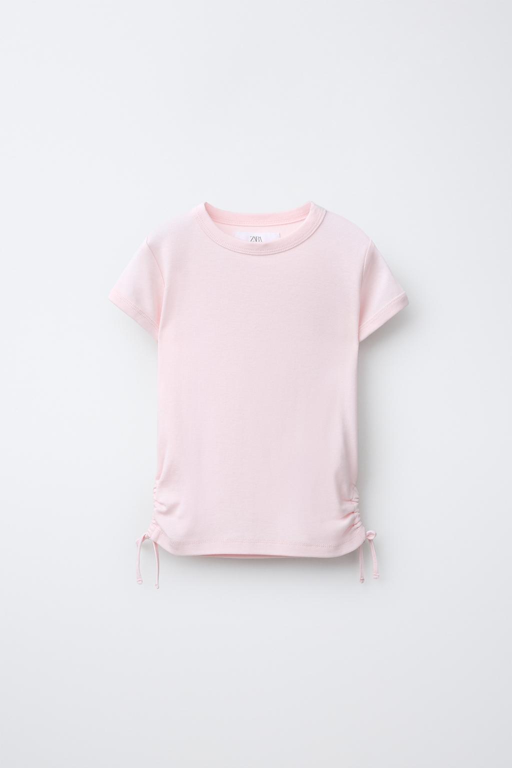 ФУТБОЛКА ИЗ МОДАЛА С ВЫРЕЗАМИ И БАНТАМИ