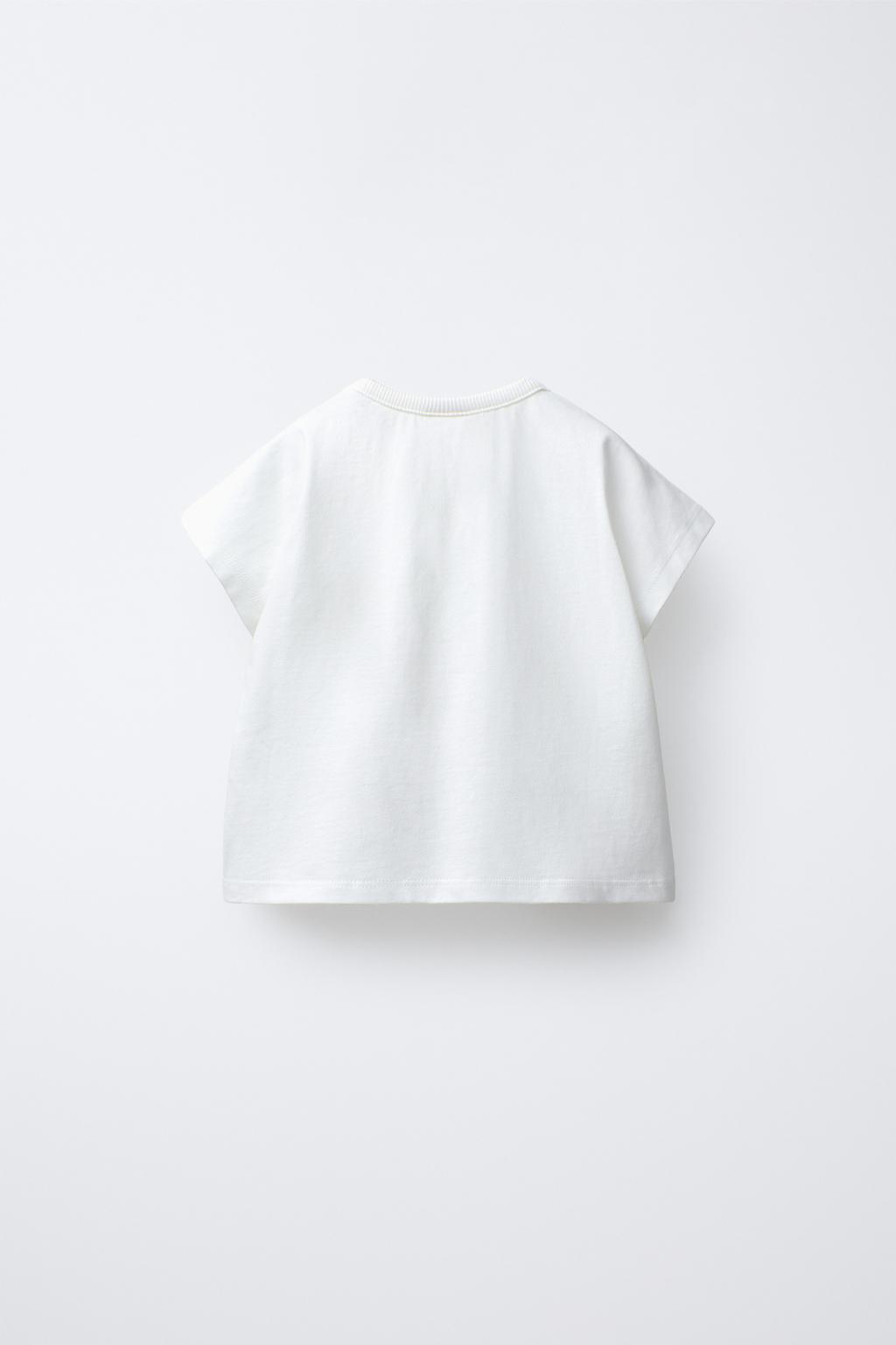 ФУТБОЛКА С ЦВЕТАМИ КРЮЧКОМ