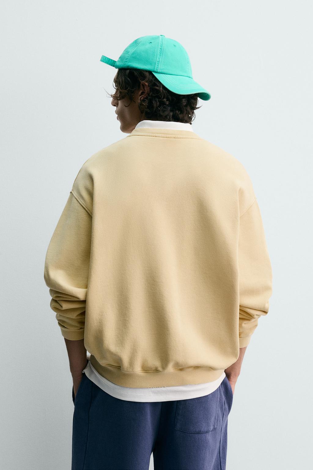 ТОЛСТОВКА С ЭФФЕКТОМ ПОТЕРТОСТИ С ПРИНТОМ