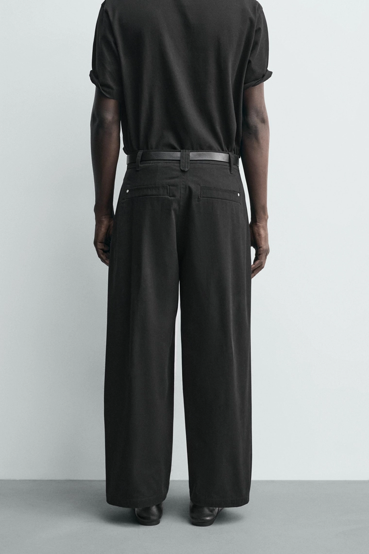 Широкие брюки с защипами