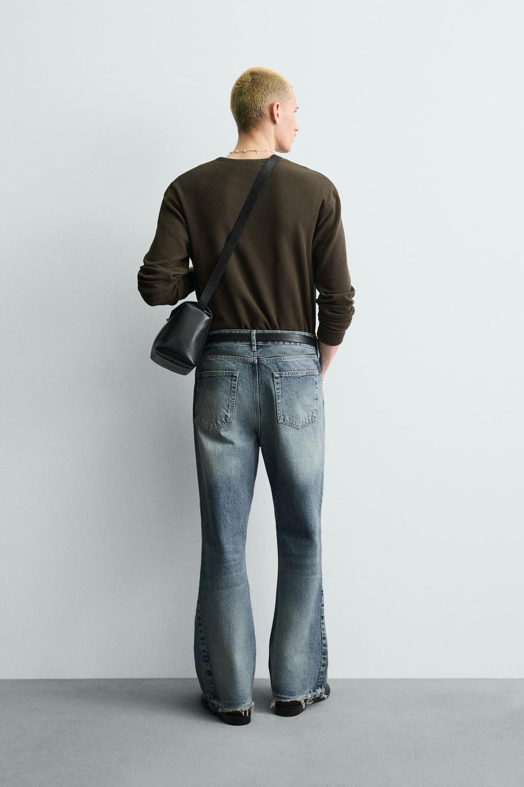 РАСКЛЕШЕННЫЕ ДЖИНСЫ С РАЗРЕЗАМИ