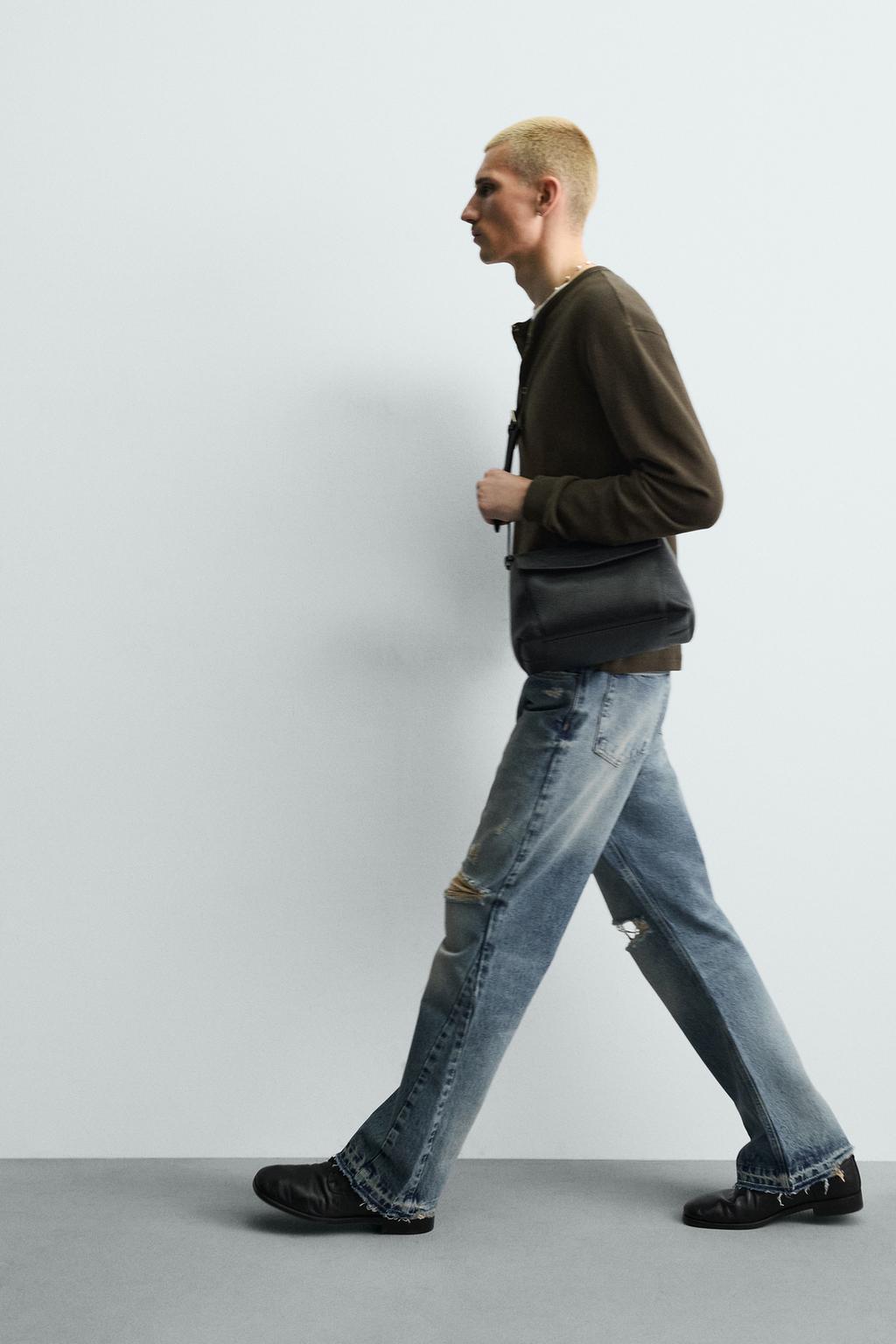 РАСКЛЕШЕННЫЕ ДЖИНСЫ С РАЗРЕЗАМИ