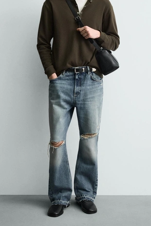 Расклешенные джинсы с разрезами- Заказать в России