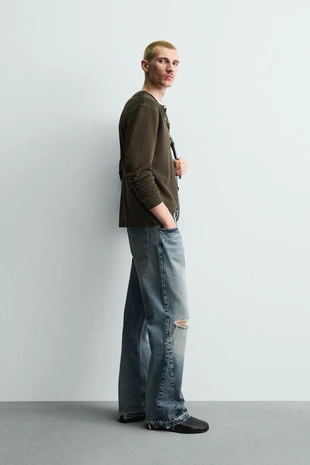 Расклешенные джинсы с разрезами- Заказать в России