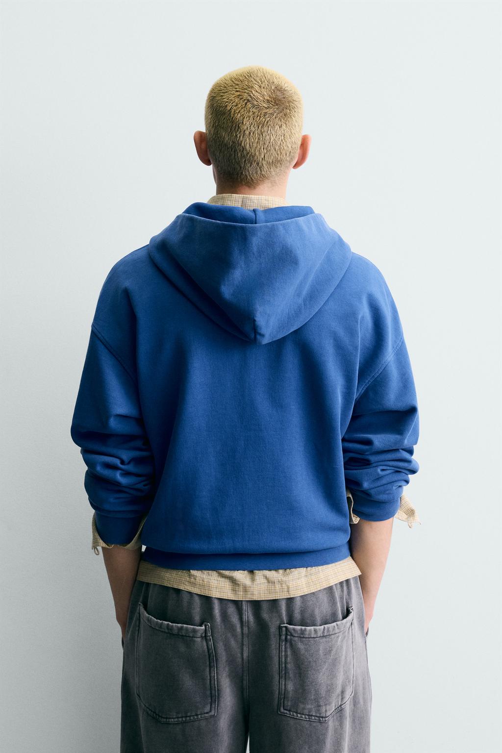 ТОЛСТОВКА С ЭФФЕКТОМ ПОТЕРТОСТИ НА МОЛНИИ С КАПЮШОНОМ