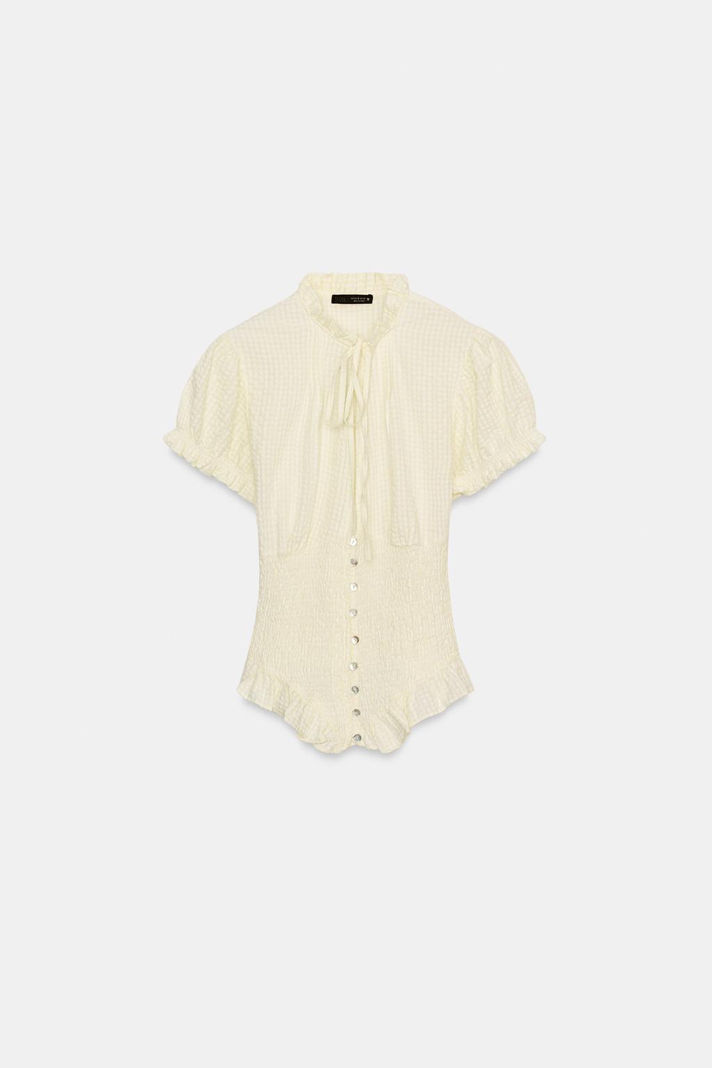 ТОП ИЗ РЕЛЬЕФНОЙ ТКАНИ С БАНТОМ