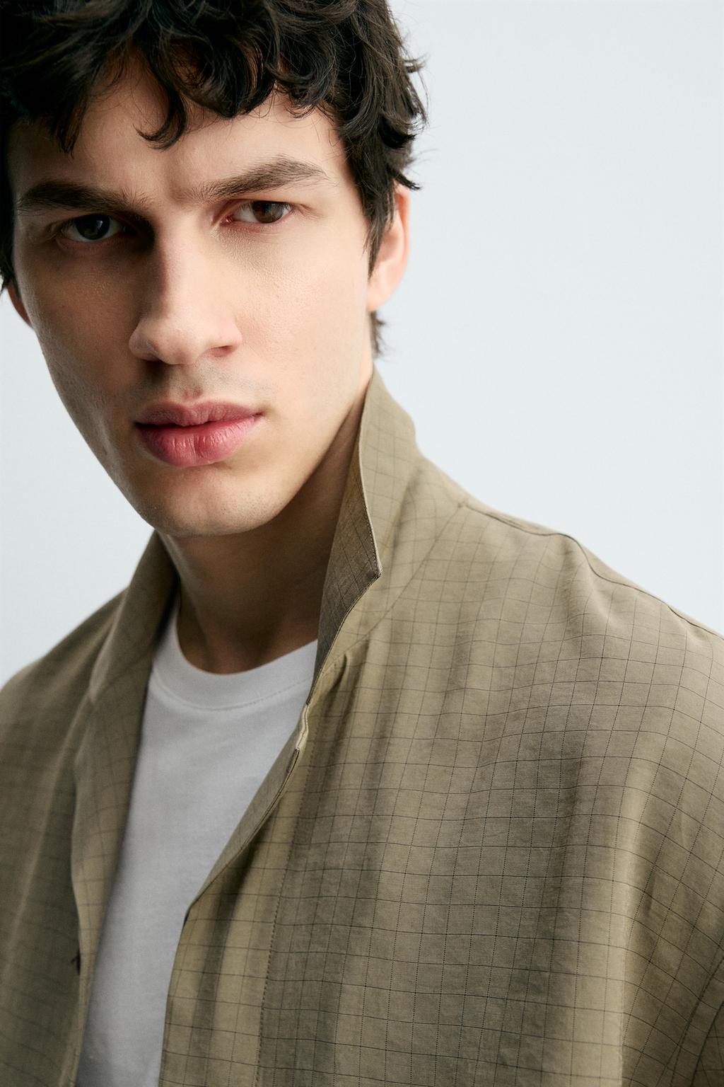 Рубашка в клетку с плавными линиями