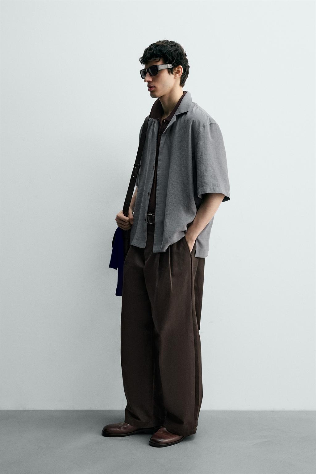 Рубашка в клетку с плавным фасоном