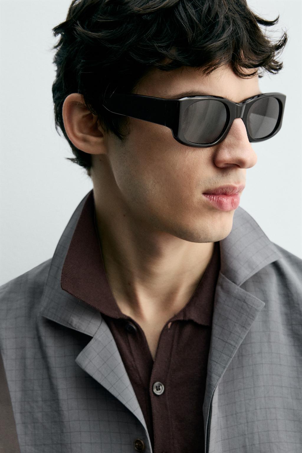 Рубашка в клетку с плавным фасоном