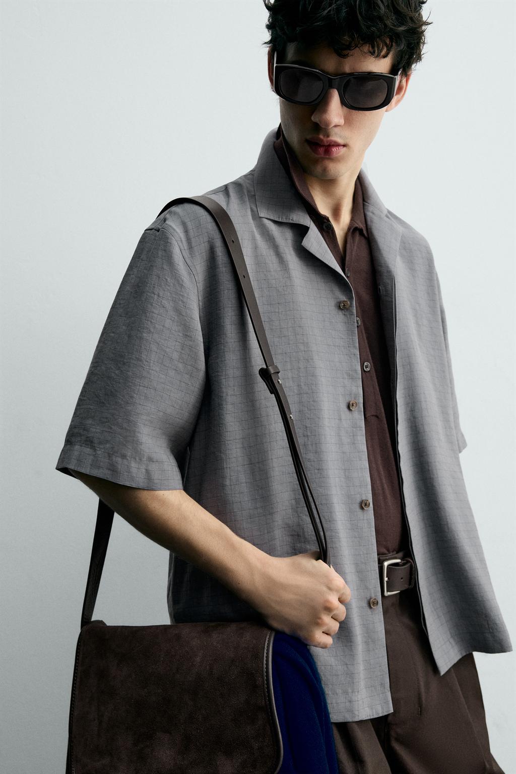 Рубашка в клетку с плавным фасоном