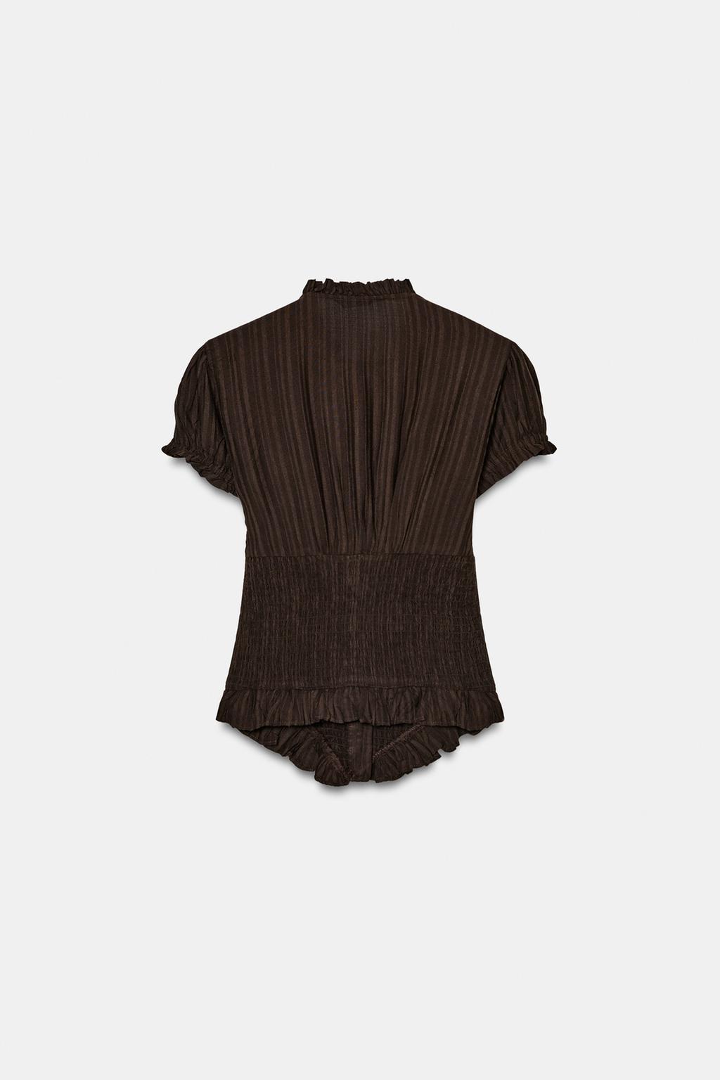 ТОП ИЗ РЕЛЬЕФНОЙ ТКАНИ С БАНТОМ