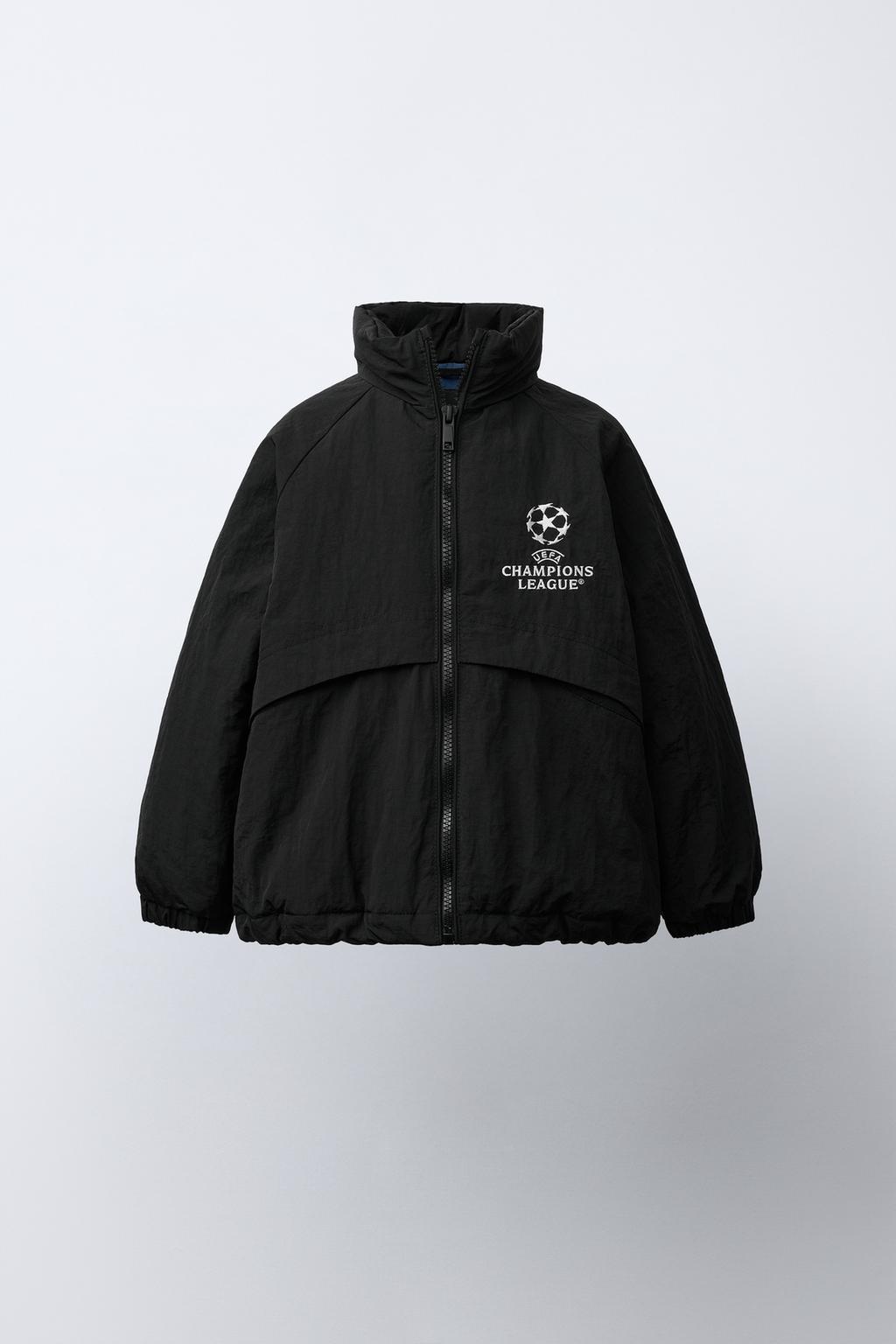 КУРТКА С ПОТАЙНЫМ КАПЮШОНОМ WATER REPELLENT UEFA CHAMPIONS LEAGUE ®