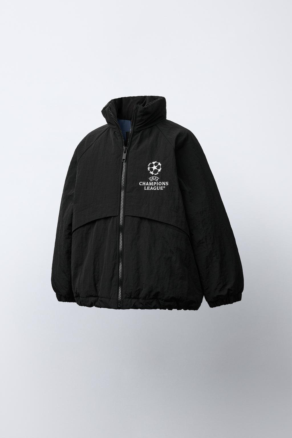 КУРТКА С ПОТАЙНЫМ КАПЮШОНОМ WATER REPELLENT UEFA CHAMPIONS LEAGUE ®