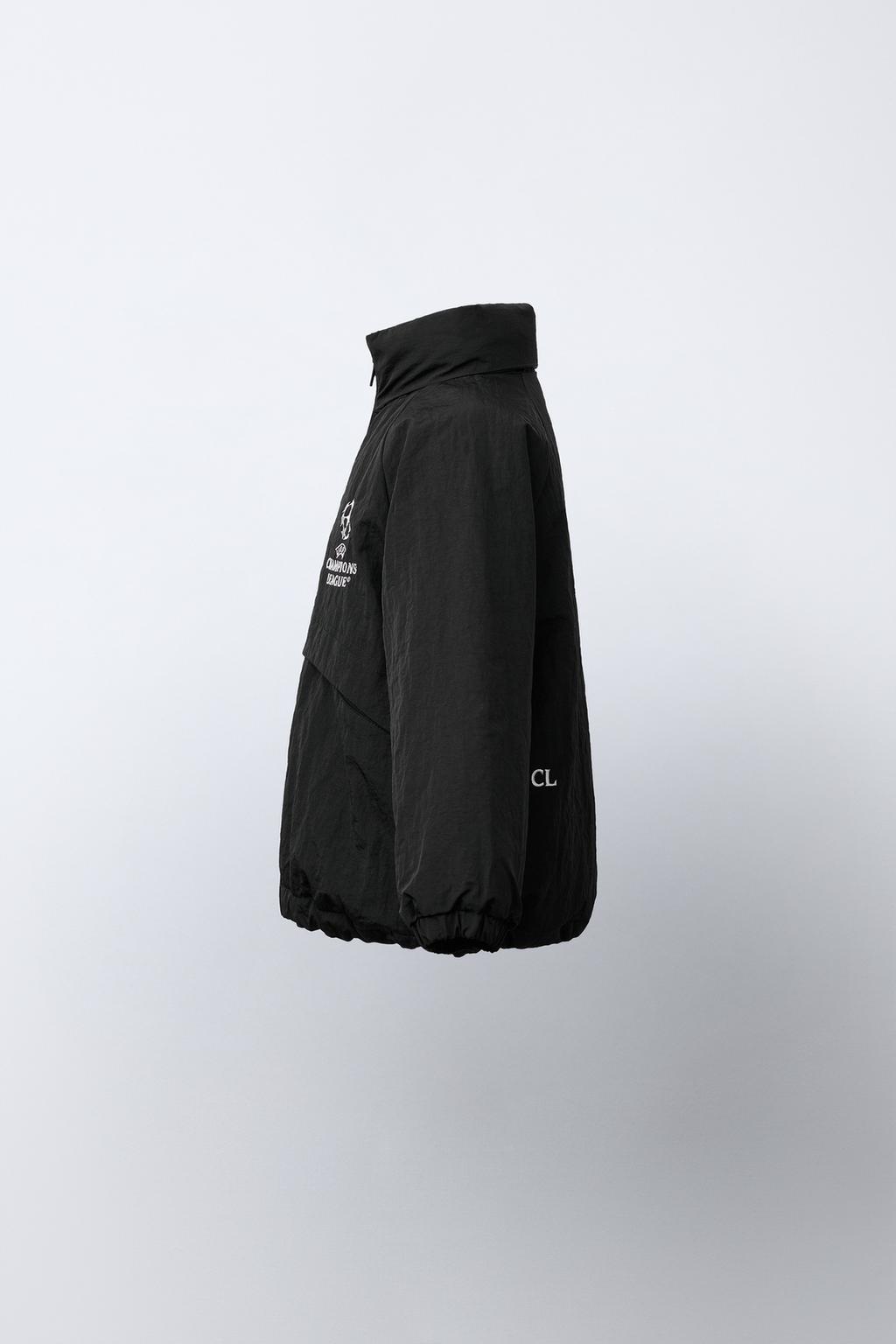 КУРТКА С ПОТАЙНЫМ КАПЮШОНОМ WATER REPELLENT UEFA CHAMPIONS LEAGUE ®