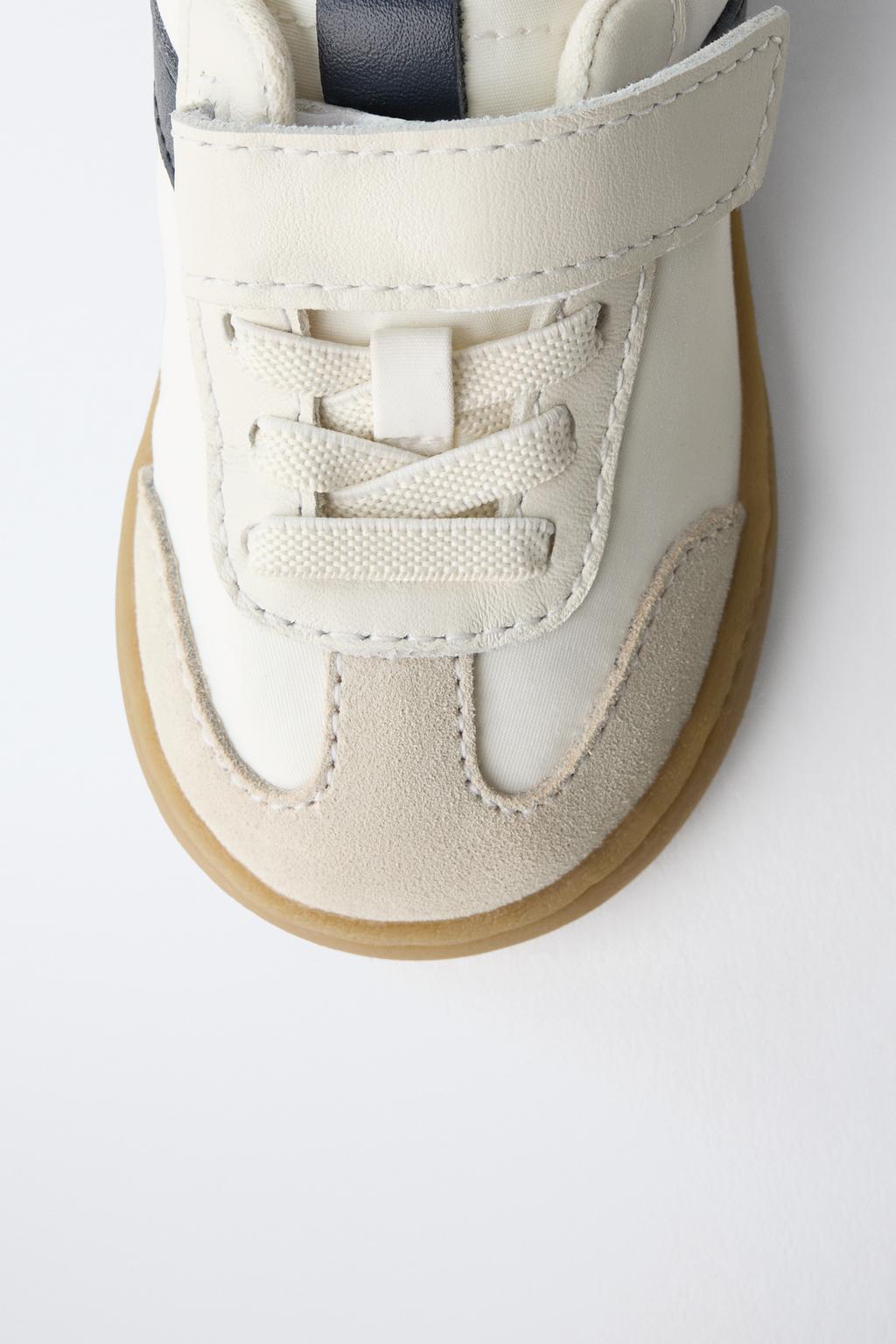 Кроссовки с контрастными деталями