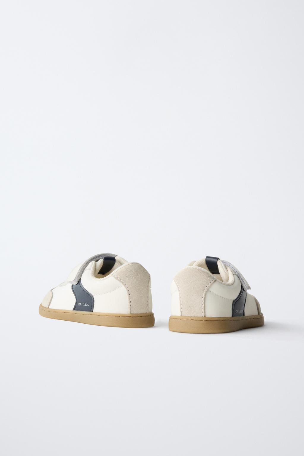 Кроссовки с контрастными деталями