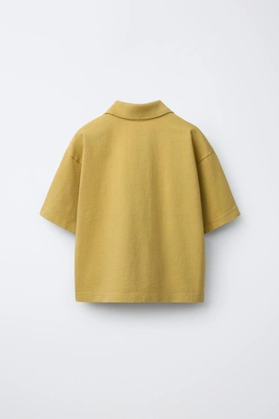 Однотонное поло из фельпы- Заказать в России