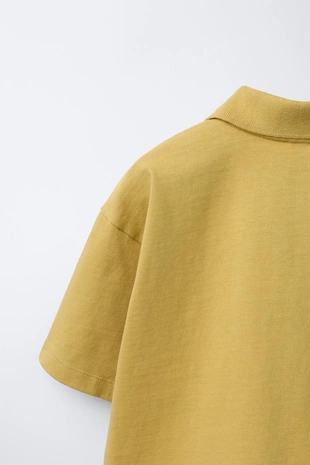 Однотонное поло из фельпы- Заказать в России