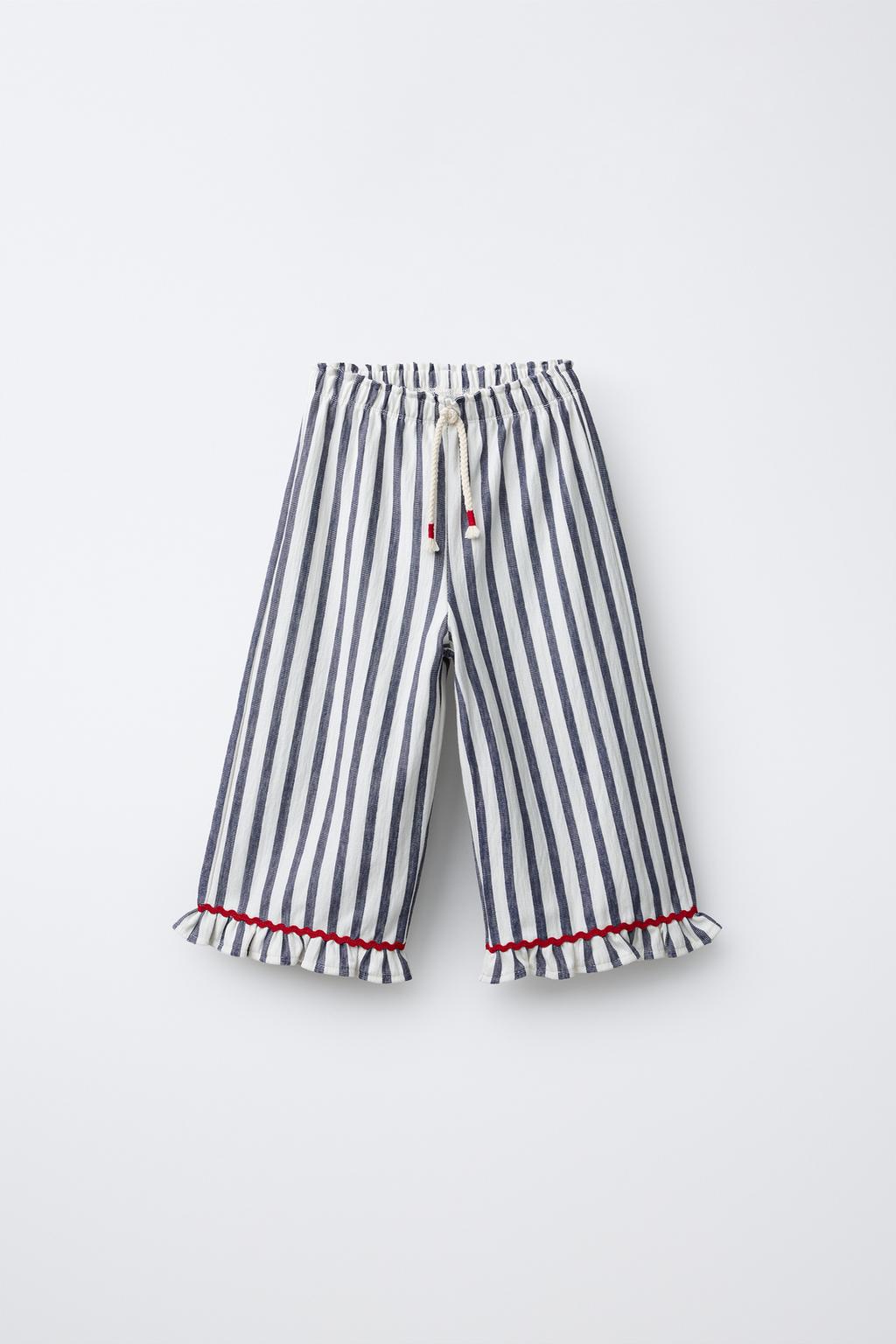 БРЮКИ В ПОЛОСКУ С ВОЛАНАМИ