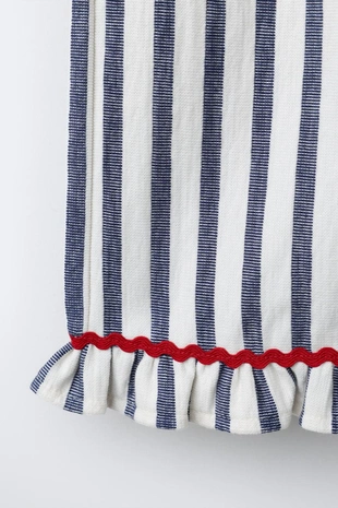 Брюки в полоску с воланами- Заказать в России