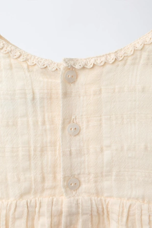 Комбинезон из рельефной ткани- Заказать в России