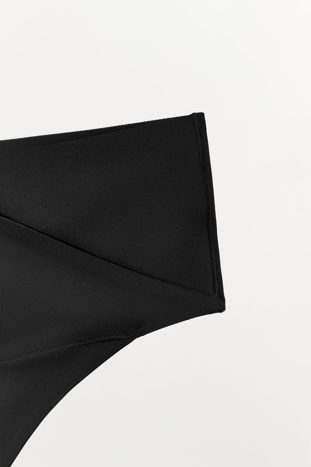 ТРУСЫ ТАНГА ИЗ СМЕСОВОГО ПОЛИАМИДА С ПЕРЕКРЕСТНЫМ ПОЯСОМ