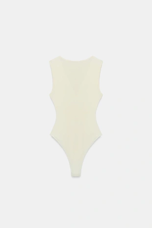 Облегающее боди с V-образным вырезом- Заказать в России