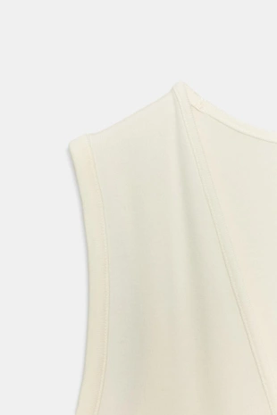 Облегающее боди с V-образным вырезом- Заказать в России