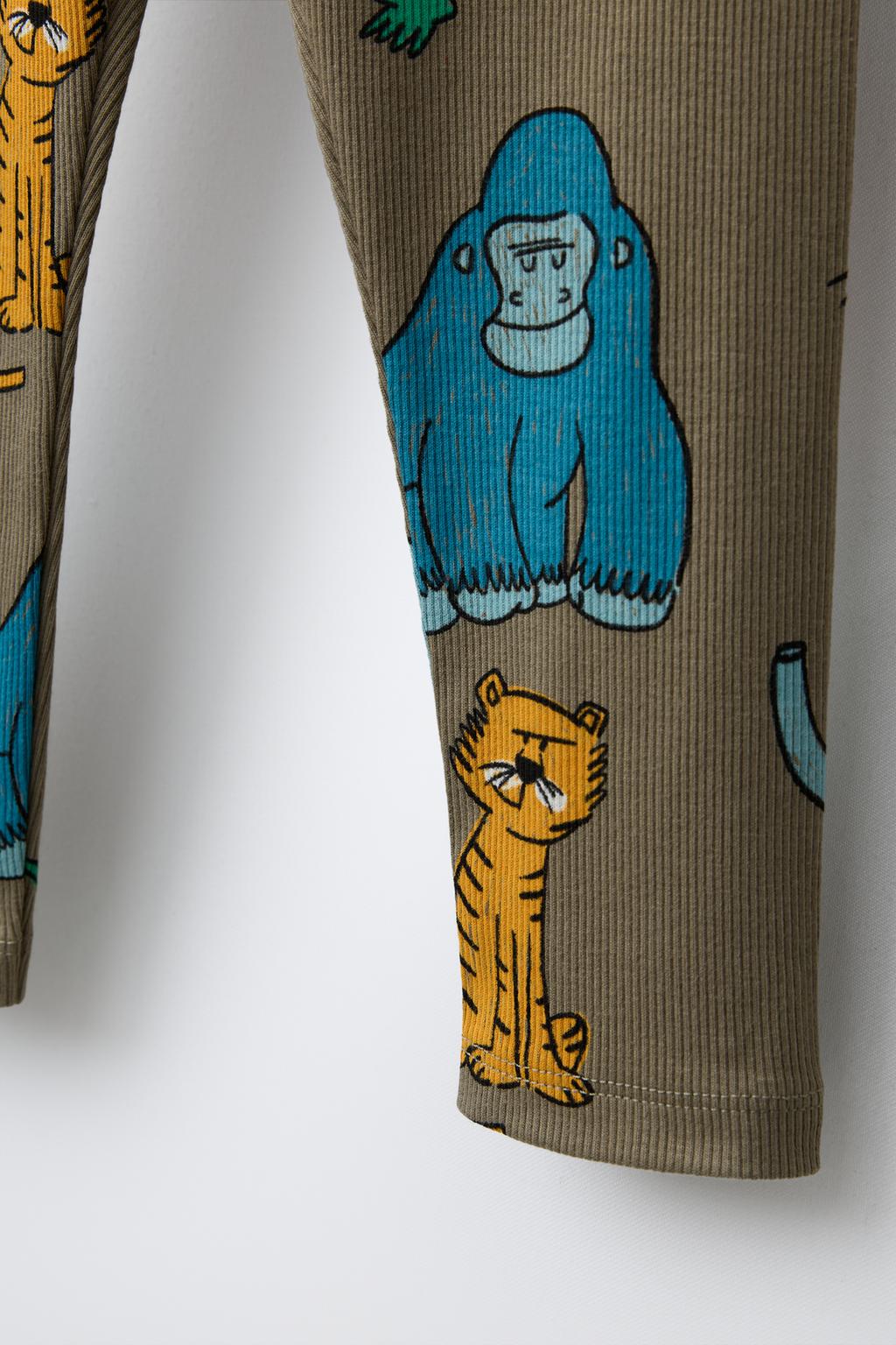 ЛЕГИНСЫ В РУБЧИК С АНИМАЛИСТИЧНЫМ ПРИНТОМ