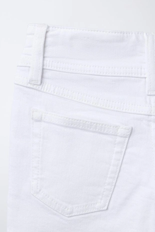 Джинсы FLARE с двумя пуговицами- Заказать в России