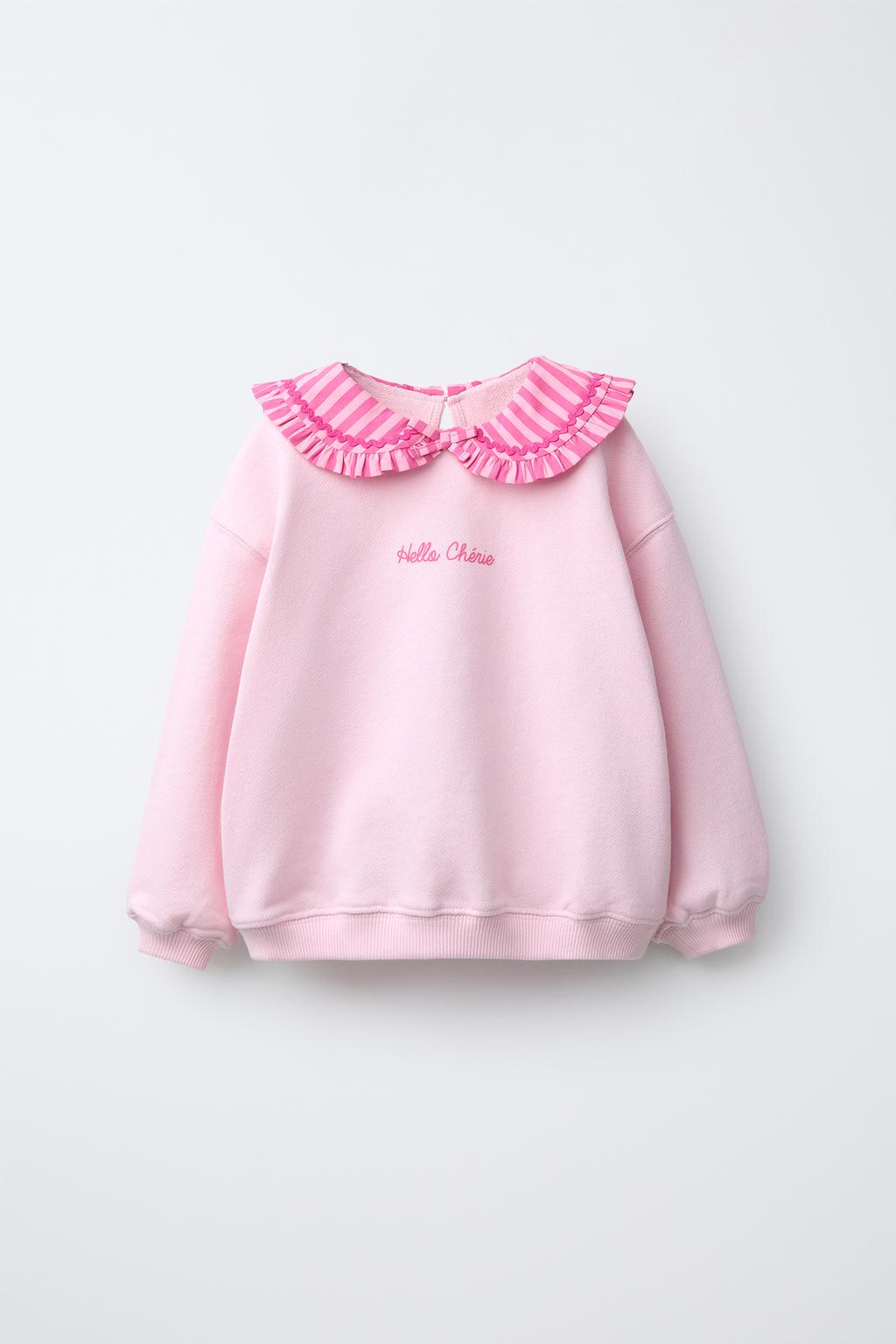 ТОЛСТОВКА С ВОРОТНИКОМ-ХОМУТОМ И ВОЛНИСТЫМ УЗОРОМ