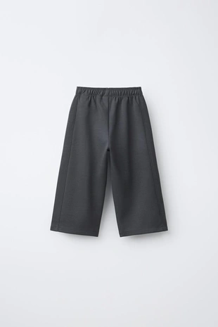 Брюки WIDE LEG из ткани интерлок с рельефной надписью- Заказать в России