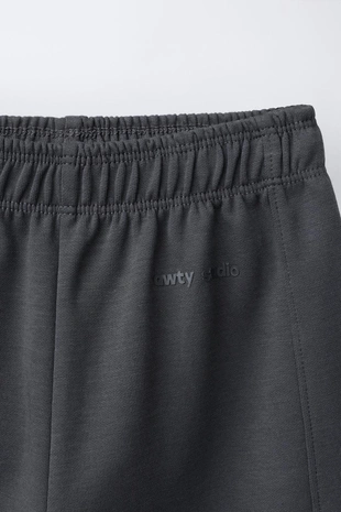 Брюки WIDE LEG из ткани интерлок с рельефной надписью- Заказать в России