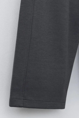 Брюки WIDE LEG из ткани интерлок с рельефной надписью- Заказать в России