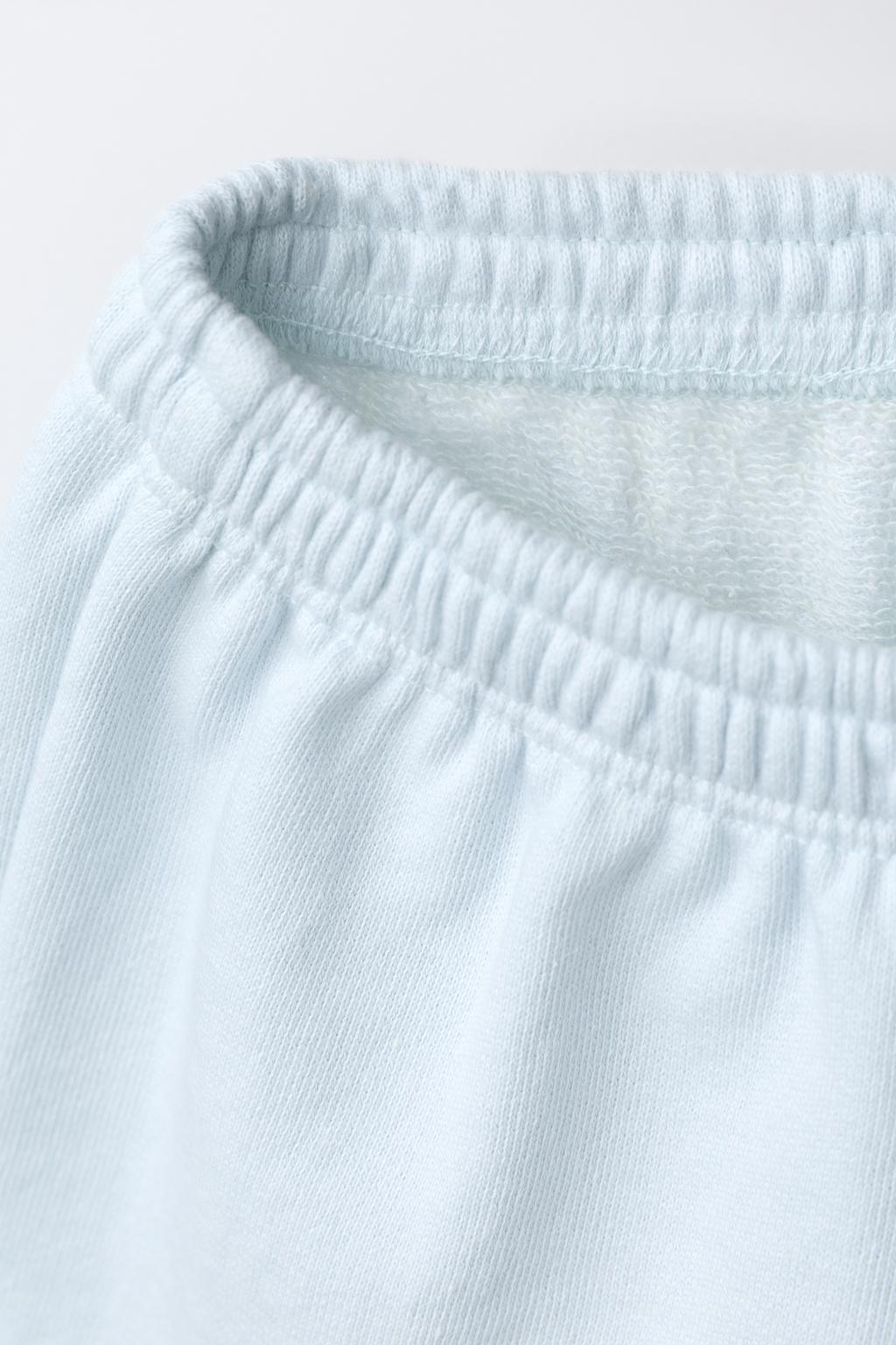 БРЮКИ-ДЖОГГЕРЫ С КАРМАНОМ И ПРИНТОМ СОБАКИ