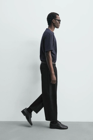 Джинсы суженные широкие- Заказать в России