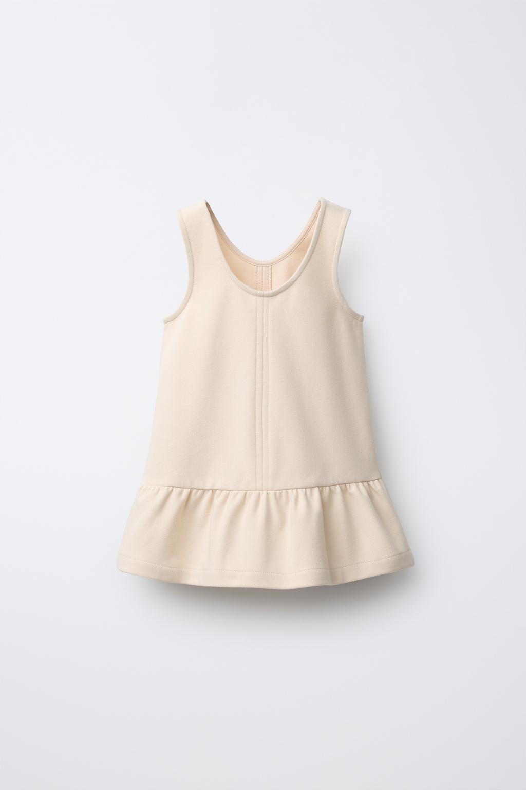 ТРИКОТАЖНОЕ ПЛАТЬЕ ИЗ ПЛОТНОГО ТРИКОТАЖА С КОНТРАСТНЫМИ ЗАВЯЗКАМИ