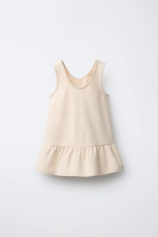 Трикотажное платье из плотного трикотажа с контрастными завязками- Заказать в России