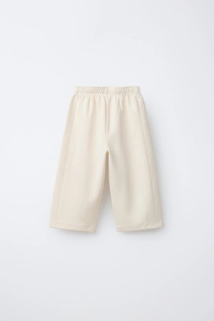 Брюки WIDE LEG из ткани интерлок с рельефной надписью- Заказать в России