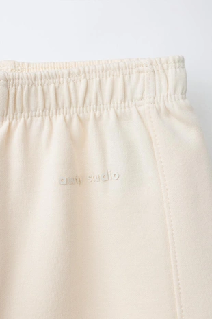 Брюки WIDE LEG из ткани интерлок с рельефной надписью- Заказать в России