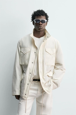 Утепленная техническая куртка с карманами- Заказать в России