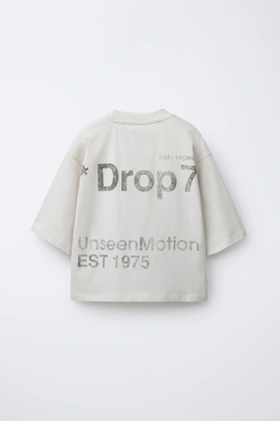 Футболка с эффектом потертости и надписью- Заказать в России