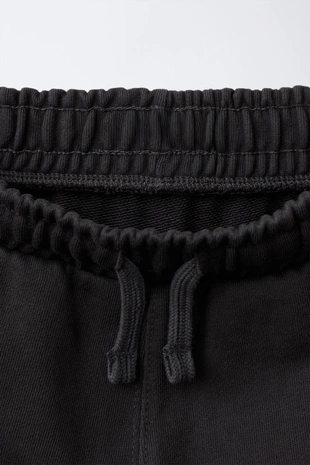 Шорты из мягкой ткани с вышитым текстом- Заказать в России